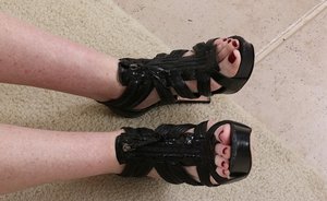 1 dark haired female tortures another during lezdom play in concrete cellar